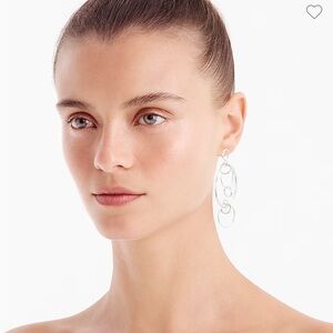 Dainty gold-plated drop-hoop earrings. Length: 2 5/8"